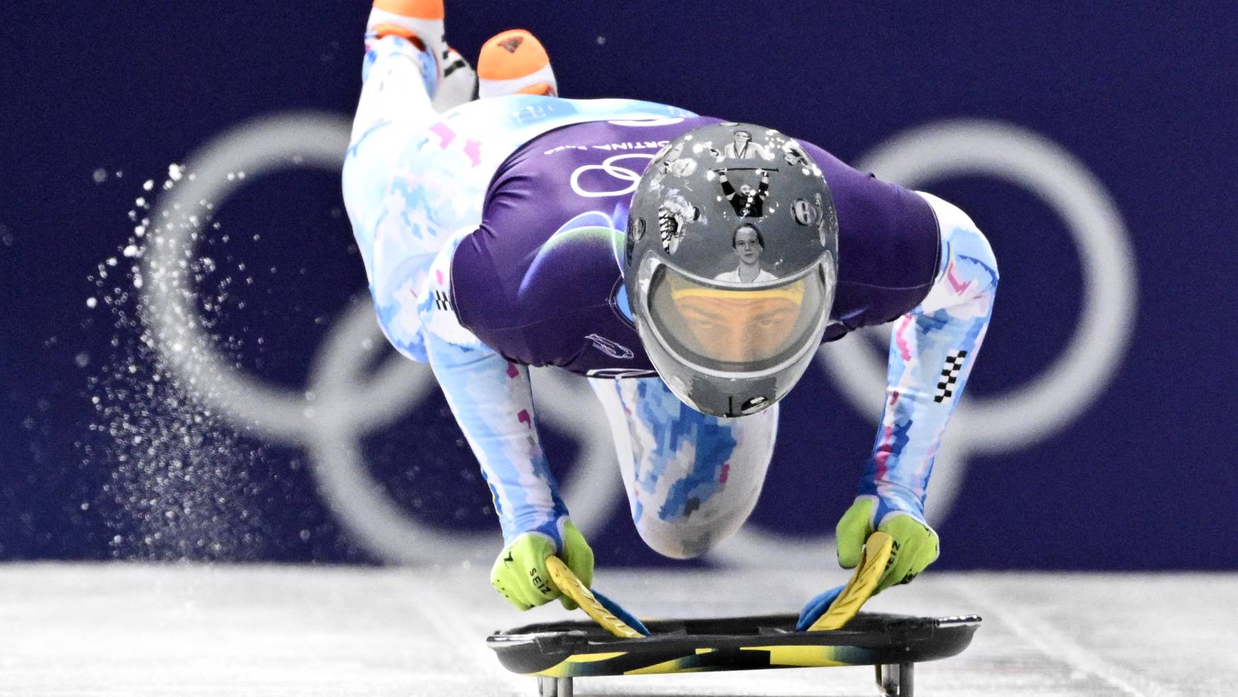 Ukraine's Vladyslav Heraskevych takes part in the skeleton men's training session at Cortina Sliding Centre during the Milano Cortina 2026 Winter Olympic Games in Cortina d'Ampezzo on February 11, 2026.