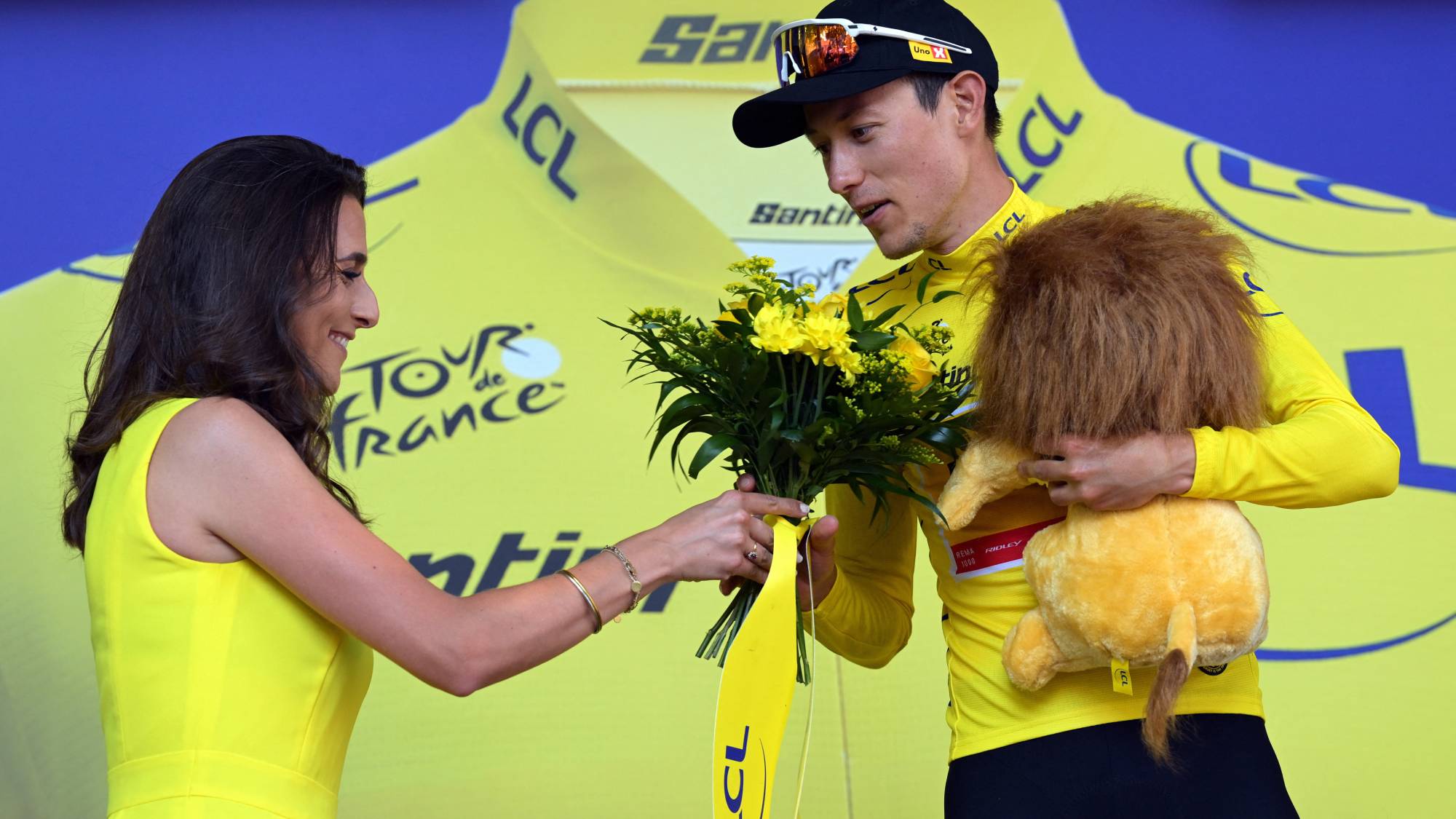 Norwegian Torstein Traeen of Uno-X Mobility celebrates on the podium in the yellow jersey of leader in the overall ranking after stage 4 of the 2026 Tour de France cycling race, a stage of 181,9km from Carcassonne to Foix, on Tuesday 07 July 2026. The 113th edition of the Tour de France starts on Saturday 4 July in Barcelona, Spain, and will finish in Paris, France on the 26th of July. BELGA PHOTO DAVID PINTENS
